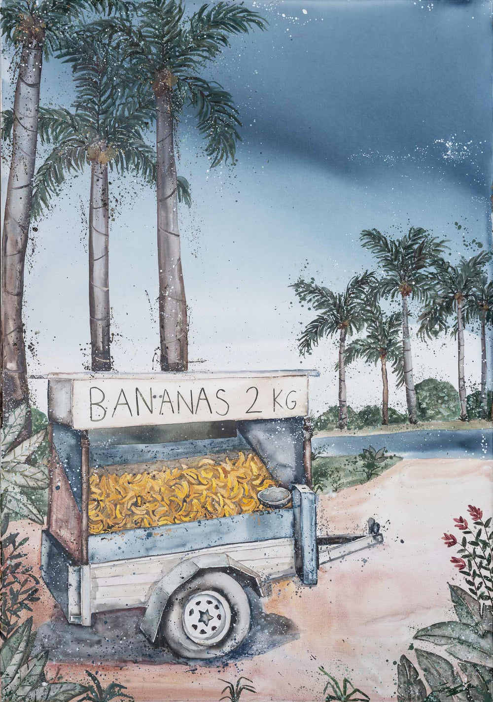 A trailer filled with bananas sits by the beach, displaying a Banana Shack – Original Artwork sign.