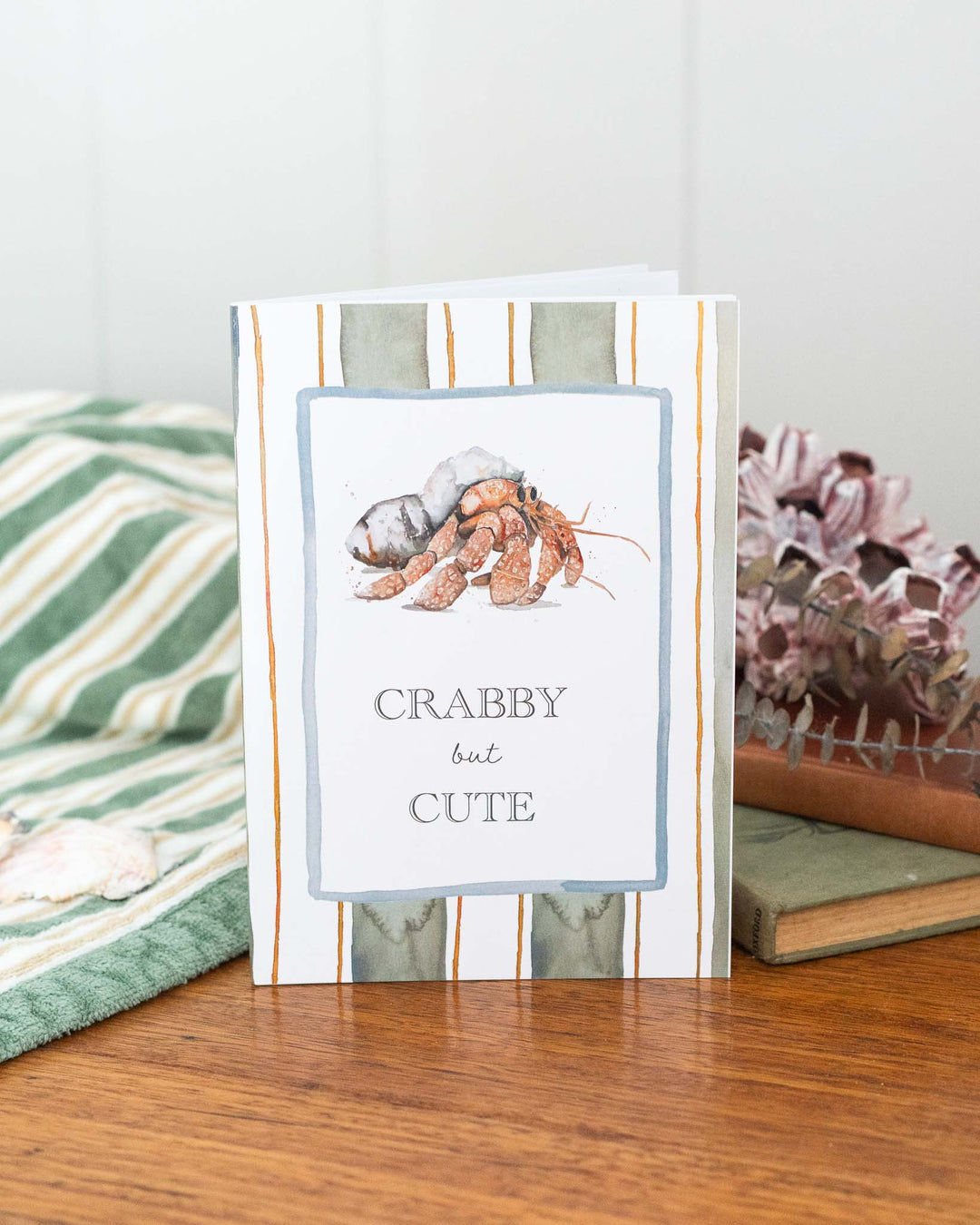 Crabby but Cute A5 lined notebook with a charming hermit crab illustration on the cover.