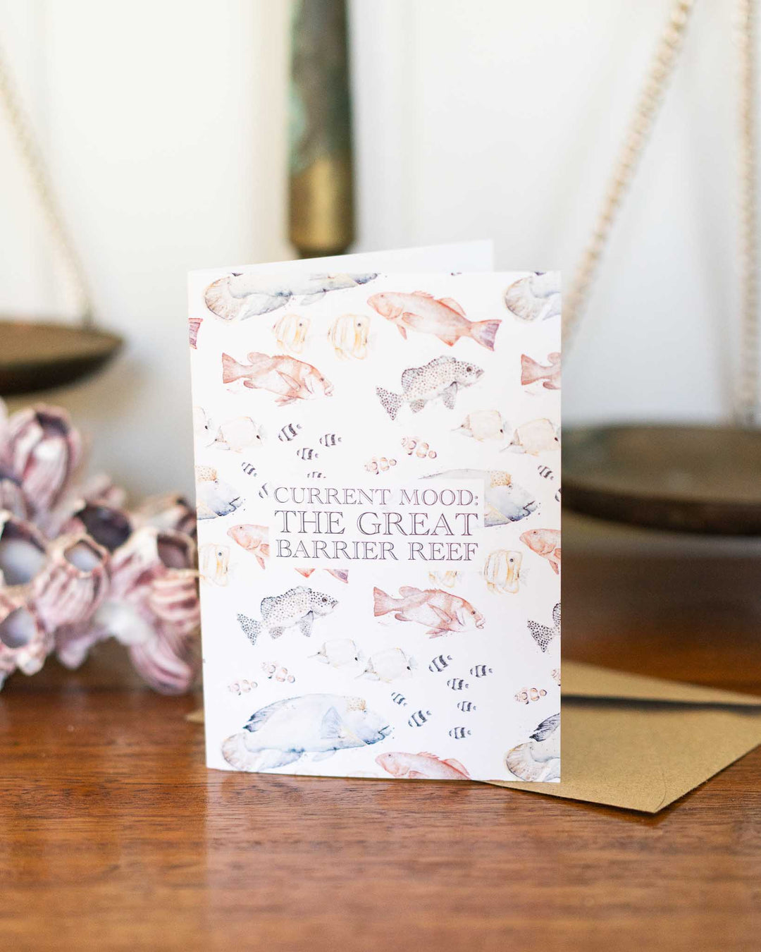 Current Mood: The Great Barrier Reef greeting card featuring colorful reef fish, scales, and shell patterns.