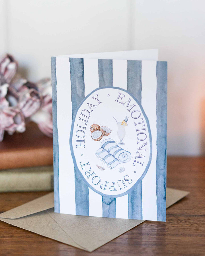 Emotional Support Holiday“ card with playful snack art, includes envelope and festive table decorations.