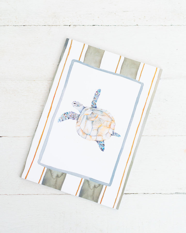 Follow Me A5 lined notebook featuring a sea turtle against a Port Douglas sunset, artwork by Stephanie Elizabeth.
