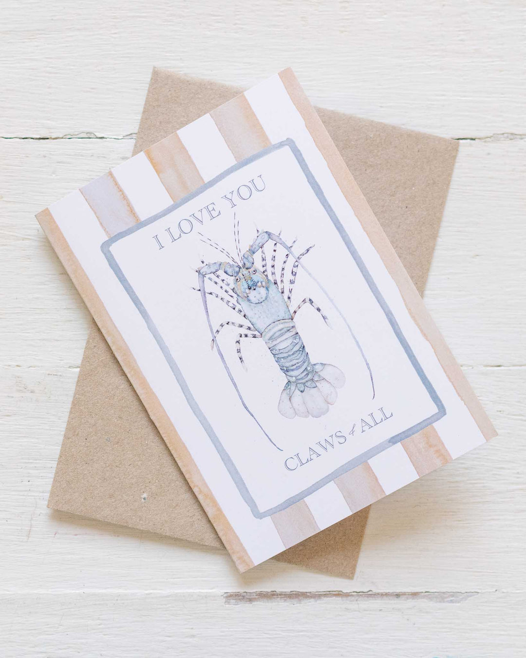 I Love You Claws and All greeting card with a red lobster and sweet message on striped background.
