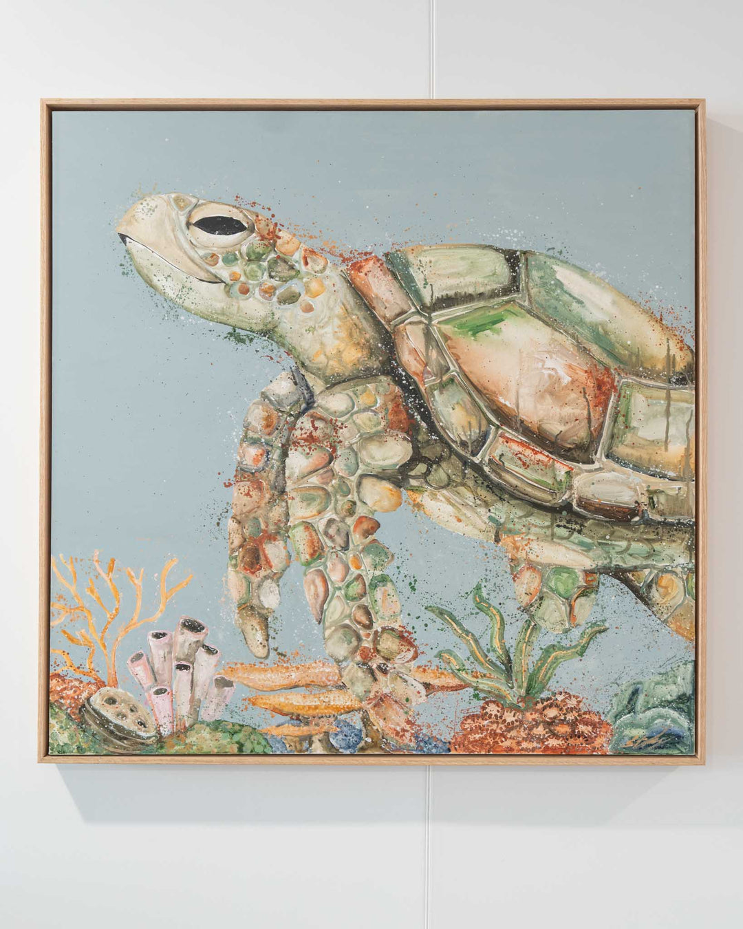 Lazy Days on Coral Cays shows a sea turtle swimming over coral in vibrant acrylics inspired by the Great Barrier Reef.