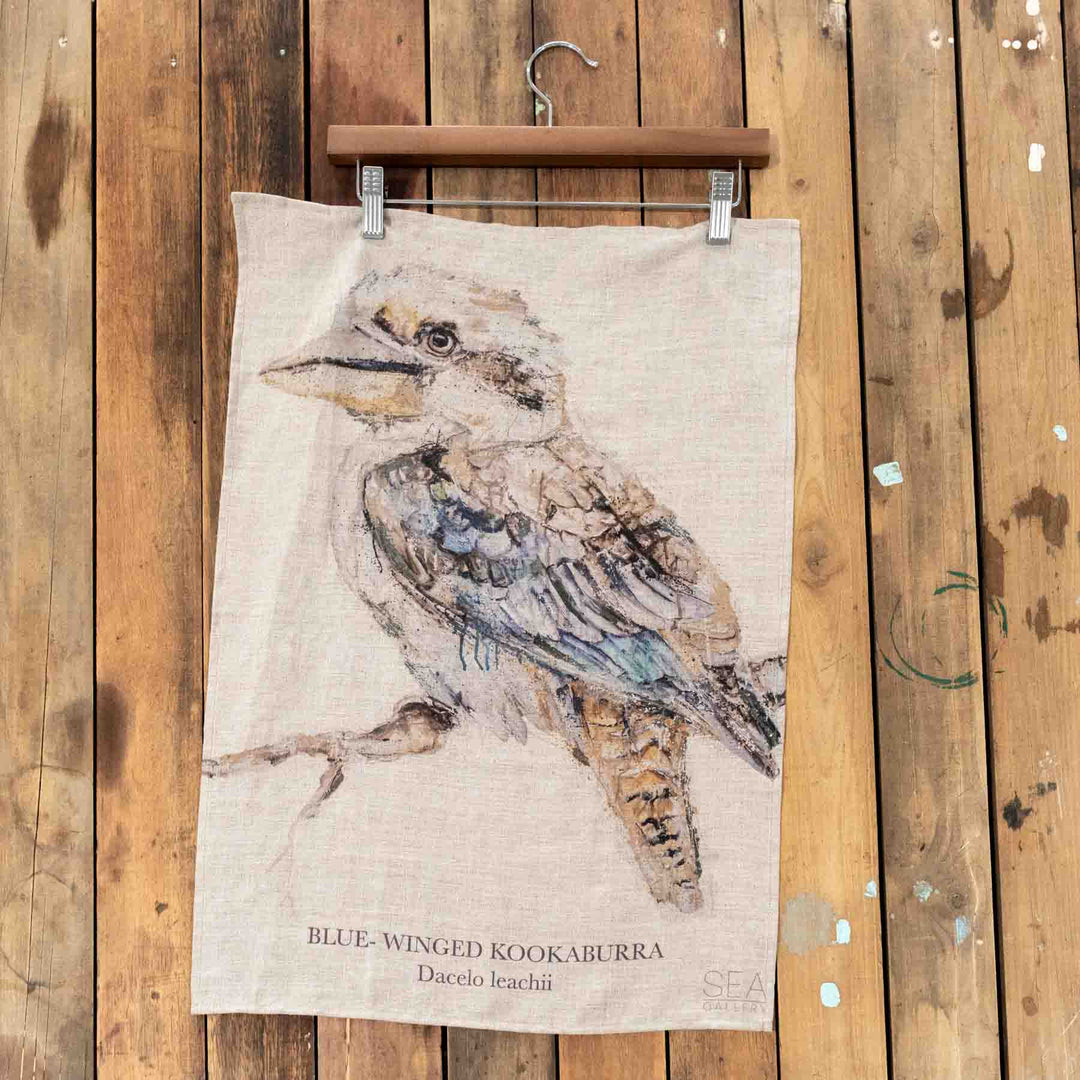 Kookaburra linen tea towel featuring blue-winged kookaburra artwork and the bird’s scientific name.