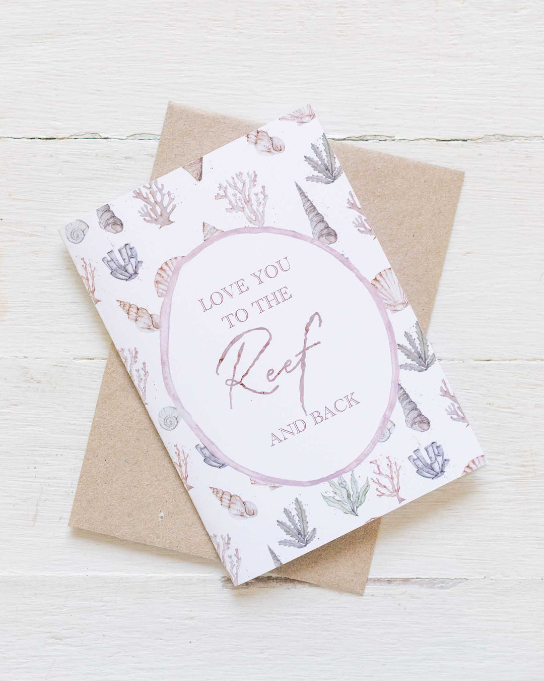 Love you to the Reef“ card with watercolor seashells and coral, eco-friendly design by Stephanie Elizabeth Artwork.