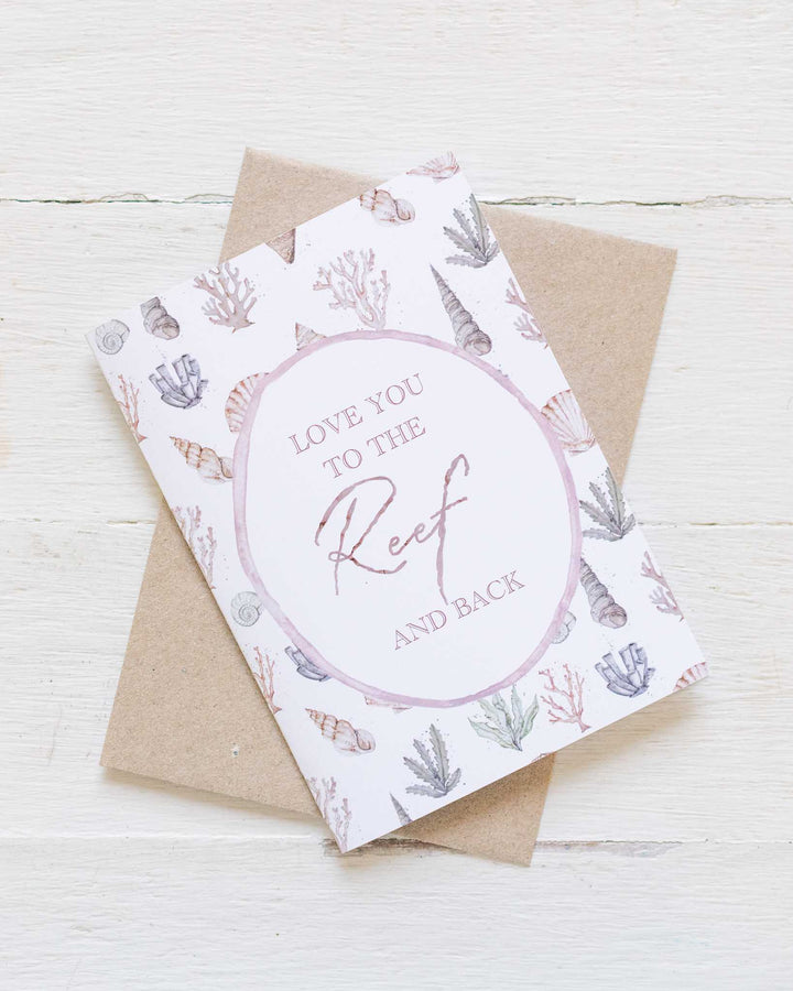 Love you to the Reef“ card with watercolor seashells and coral, eco-friendly design by Stephanie Elizabeth Artwork.