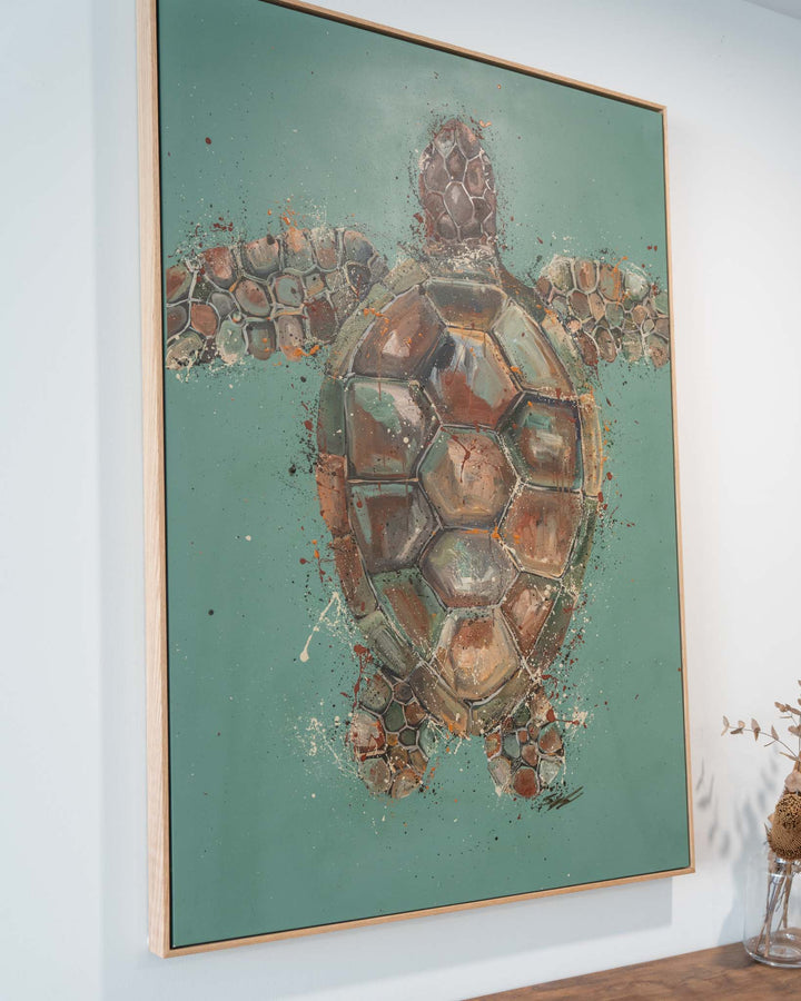 Running on Good Vibes by Stephanie Elizabeth: acrylic sea turtle on teal background, framed in light wood.