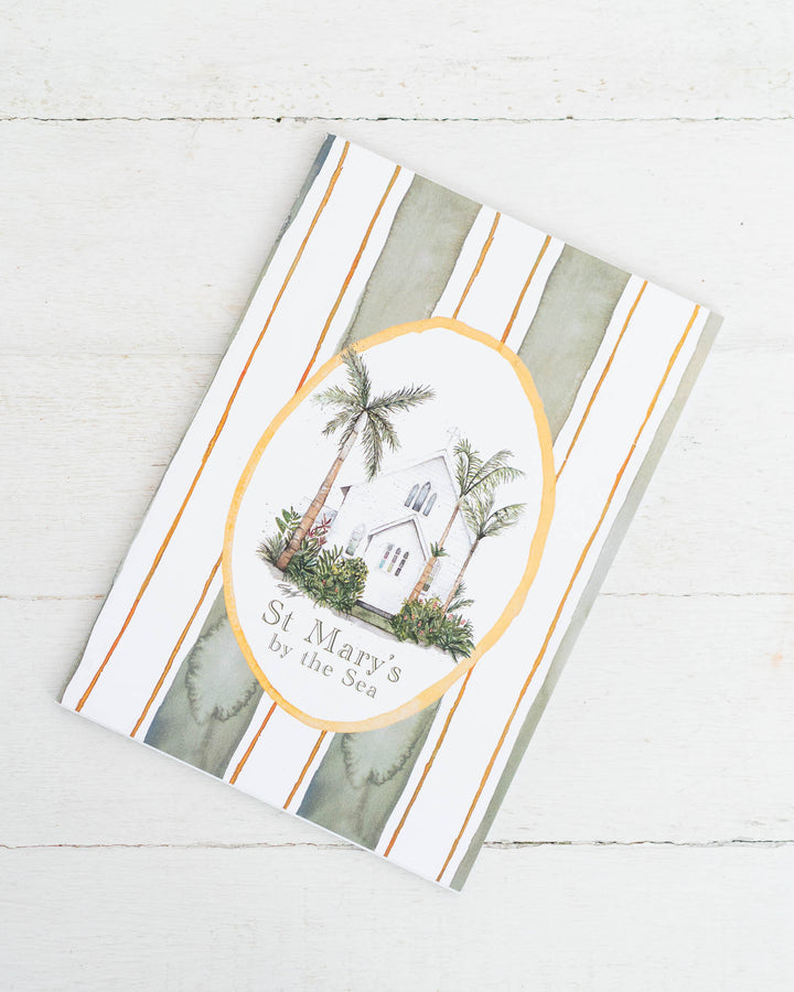 St Mary’s by the Sea A5 lined notebook with church and palm tree illustration on the cover.