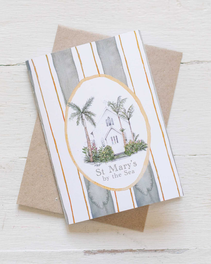 St Mary’s By the Sea greeting card featuring palm trees against a striped background by Stephanie Elizabeth.