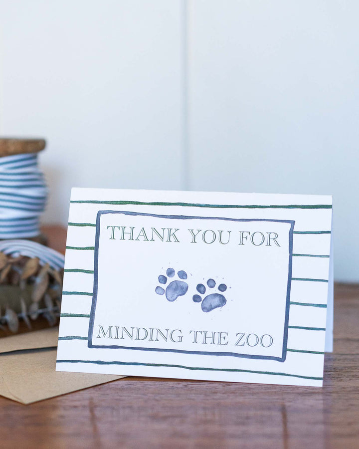 Thank You For Minding The Zoo greeting card with watercolor paw prints and playful handwritten text.