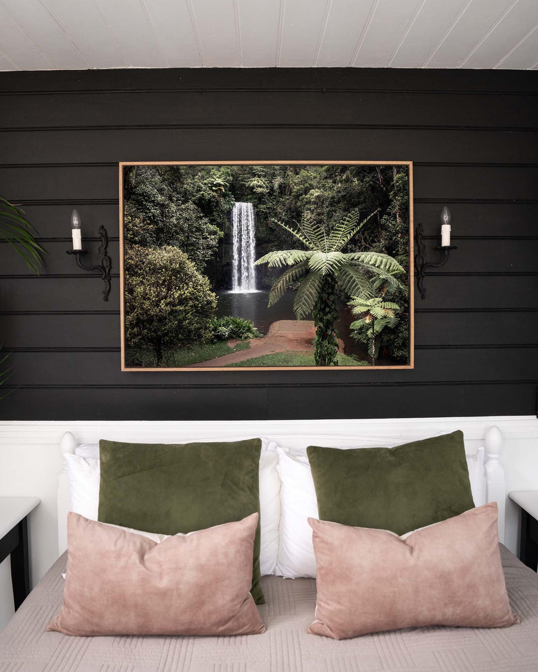 Framed A Hop, Skip and Jump | Atherton Tablelands aerial print hanging on a black wall above a bed.