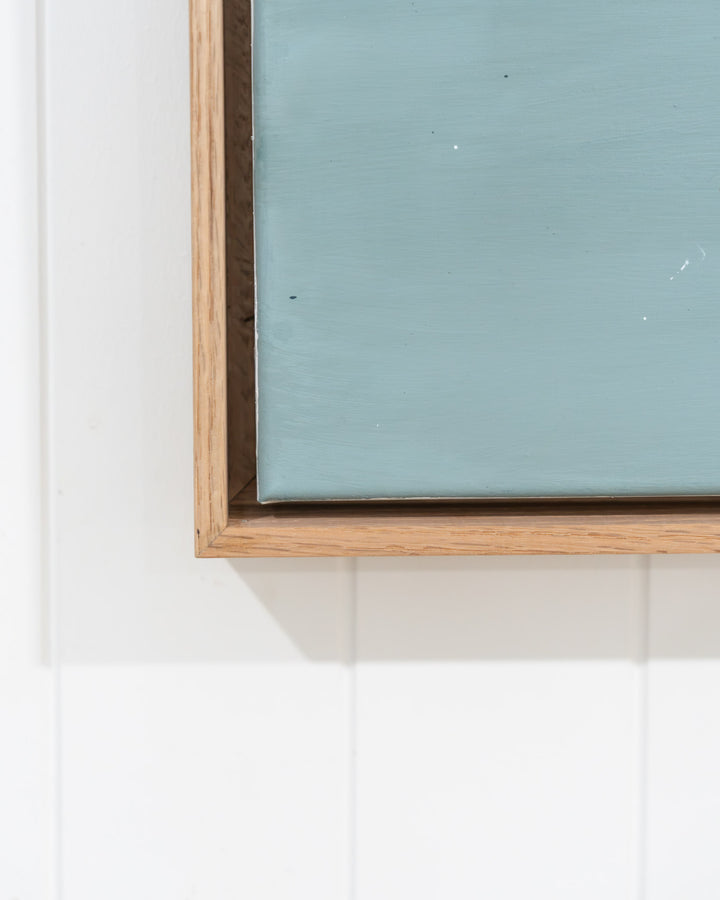 Framed canvas of “A Life Growing Together” against a white paneled wall.