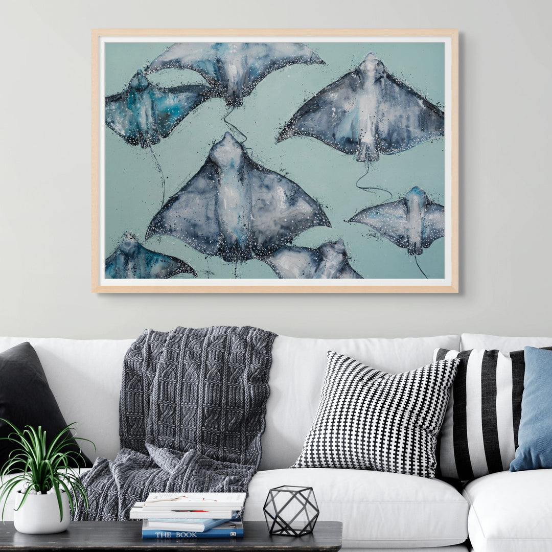 A Sea of Spots by Stephanie Elizabeth – framed paper print of eagle rays with teal background, fine art marine life print