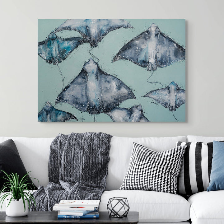 A Sea of Spots by Stephanie Elizabeth – stretched canvas print of spotted eagle rays with teal background, fine art marine print