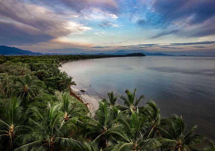 After The Storm – Aerial view of Four Mile Beach at sunrise during blue hour, purple skies after Cyclone Jasper, Port Douglas | Unframed Rolled Print
