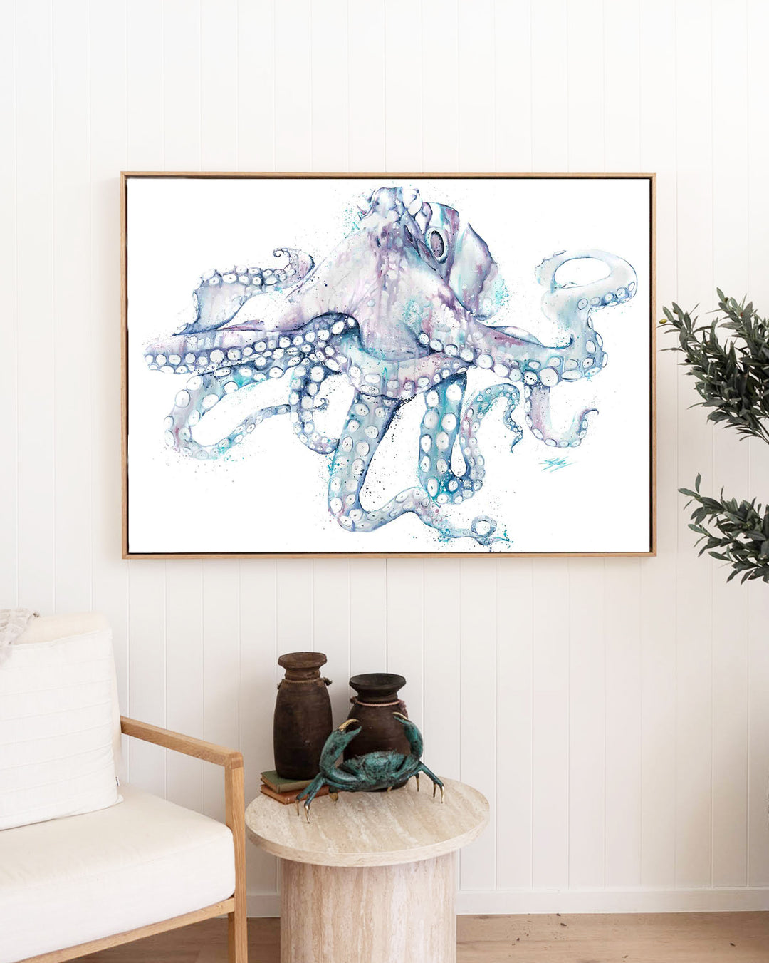 All Legs and No Worries octopus fine art print by Stephanie Elizabeth, framed canvas in an oak frame in a living room