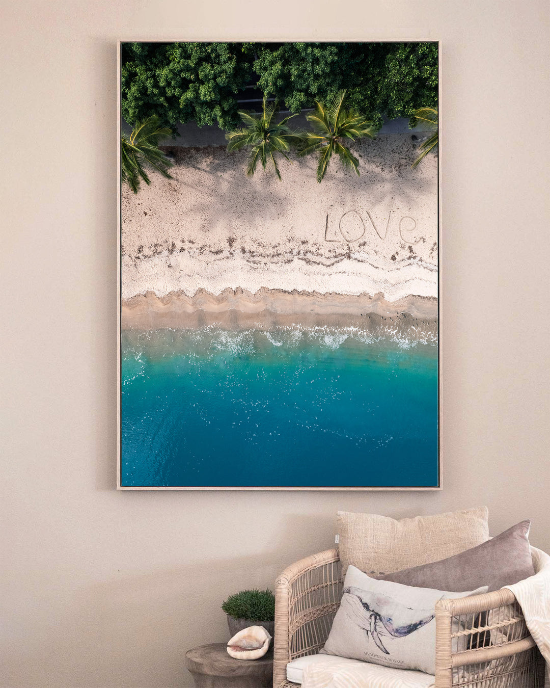 All You Need Is... – Whitsundays, Aerial Photography by David Lloyd, framed canvas print in oak float frame, styled in a sitting room setting