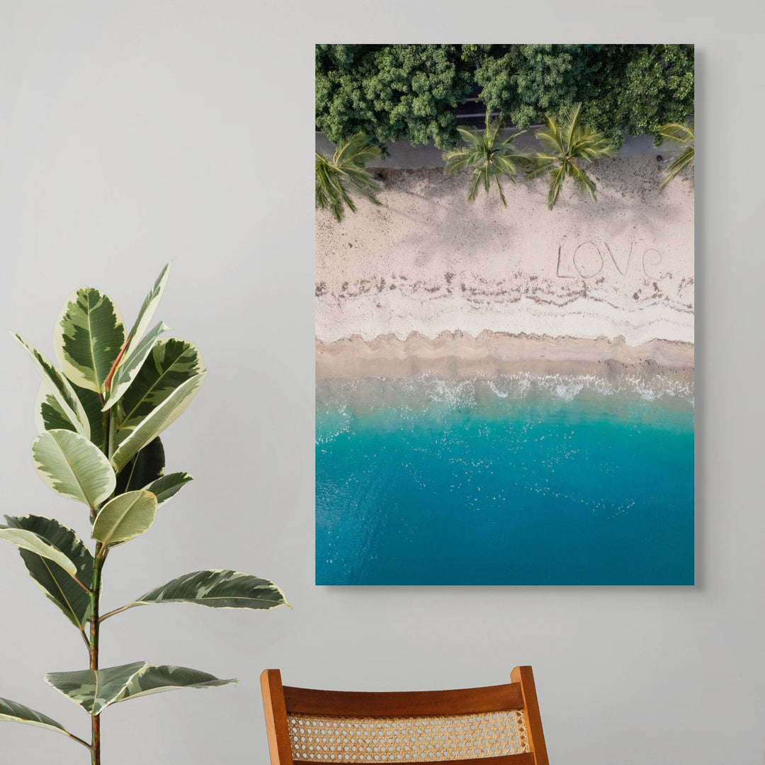 All You Need Is… – Aerial view of the Whitsundays with “Love” written on the beach, turquoise water and palm trees above and below | Stretched Canvas Print