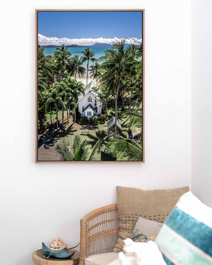 Always Forever – St Mary’s, Port Douglas, Aerial Photography by David Lloyd, framed canvas print in oak float frame, styled in a coastal lounge setting