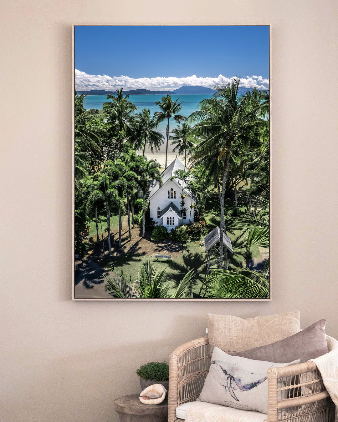 Always Forever – St Mary’s, Port Douglas, Aerial Photography by David Lloyd, framed canvas print in oak float frame, styled in a sitting room setting