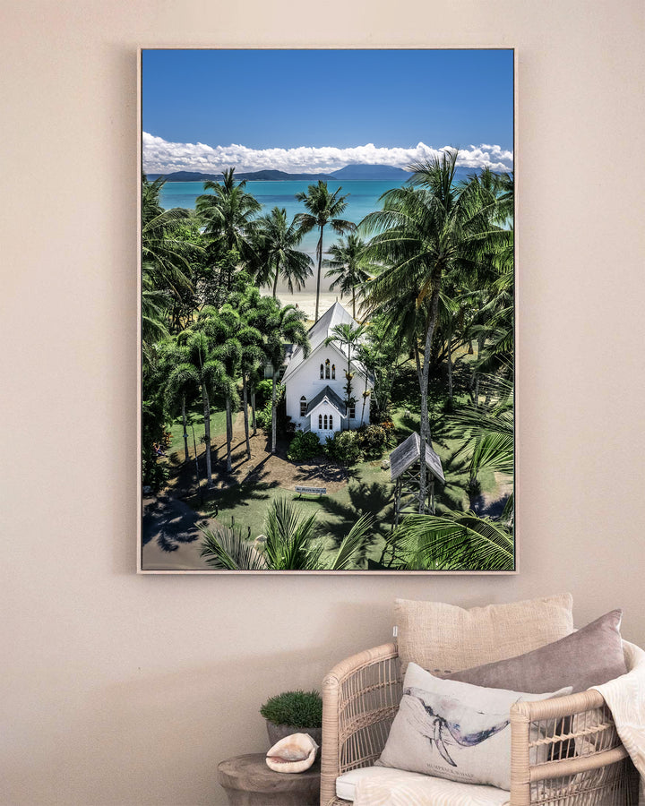 Always Forever – St Mary’s, Port Douglas, Aerial Photography by David Lloyd, framed canvas print in oak float frame, styled in a sitting room setting