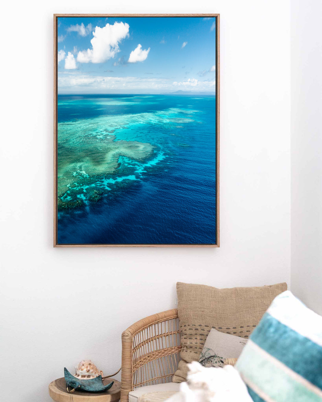 Always Take The Weather With You – Rudder Reef, Aerial Photography by David Lloyd, framed canvas print in oak float frame, styled in a coastal lounge setting