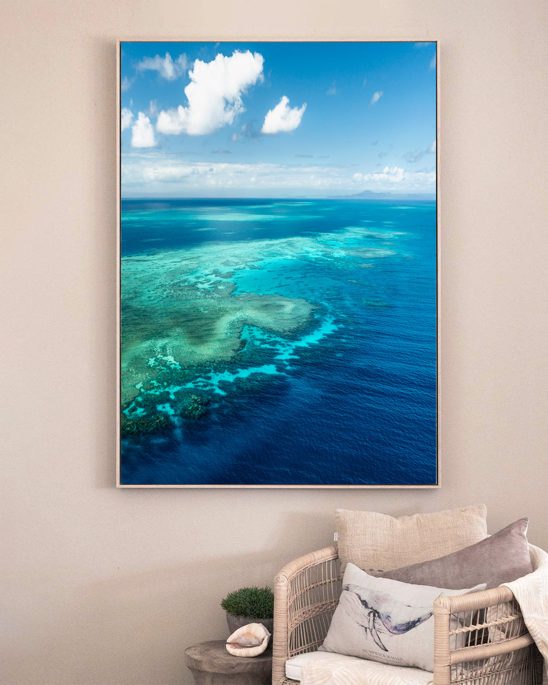 Always Take The Weather With You – Rudder Reef, Aerial Photography by David Lloyd, framed canvas print in oak float frame, styled in a sitting room setting