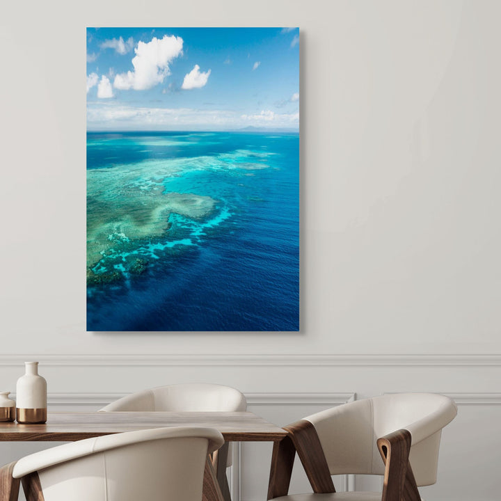 Always Take The Weather With You – Aerial view of Rudder Reef with turquoise waters and reef patterns | Stretched Canvas Print by David Lloyd