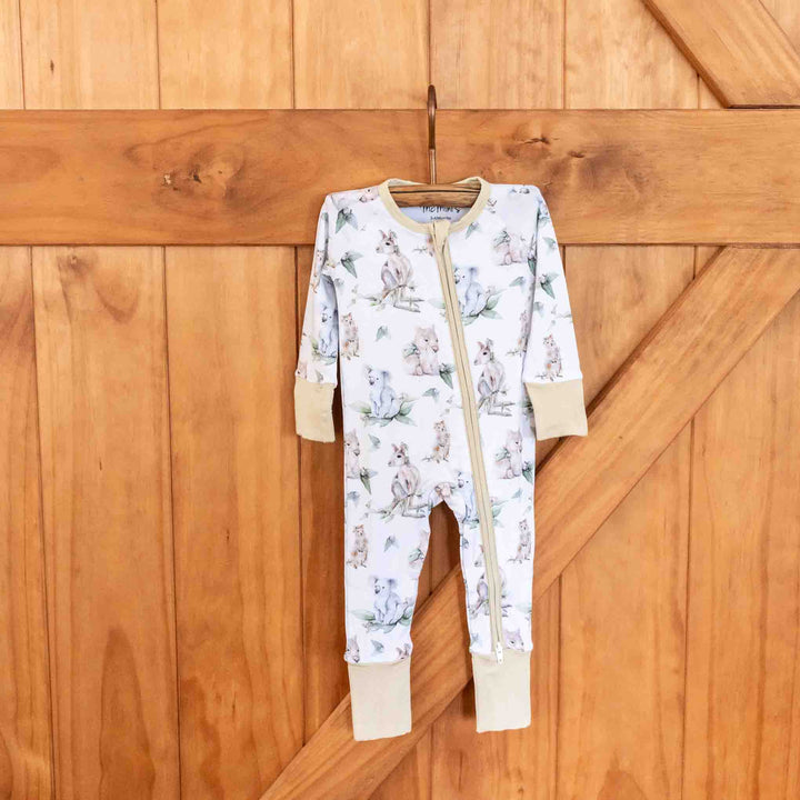 Aussie Animals Baby Onesie – Kangaroo, Wombat, Koala, Quokka - on hanger full against wall