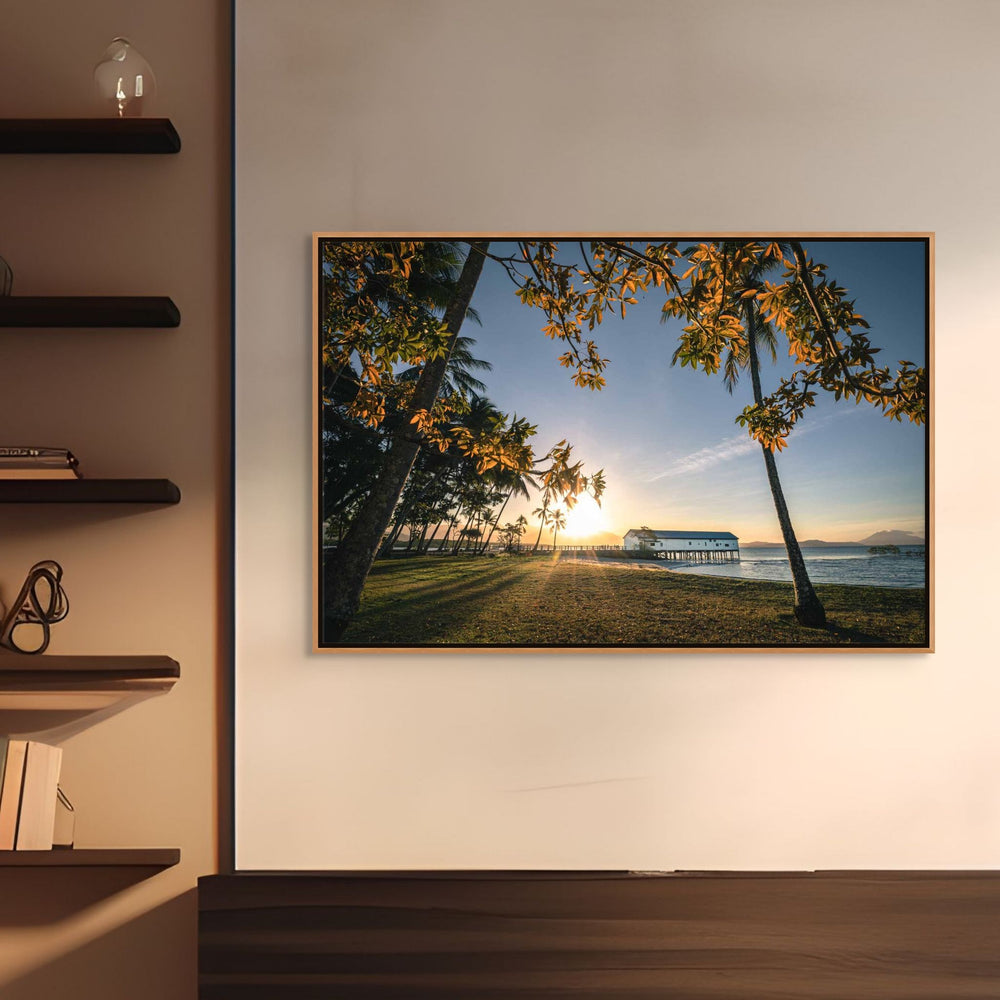 Autumn Sugar – Landscape photograph of the Sugar Wharf in Port Douglas framed by autumn leaves with golden sunset light | Shadow Box Canvas Print