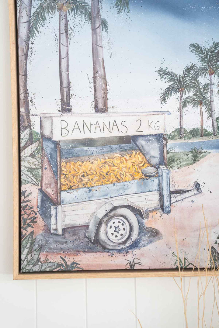 Banana Shack: A colorful trailer with bananas and palm trees in a tropical still life by Stephanie Elizabeth.