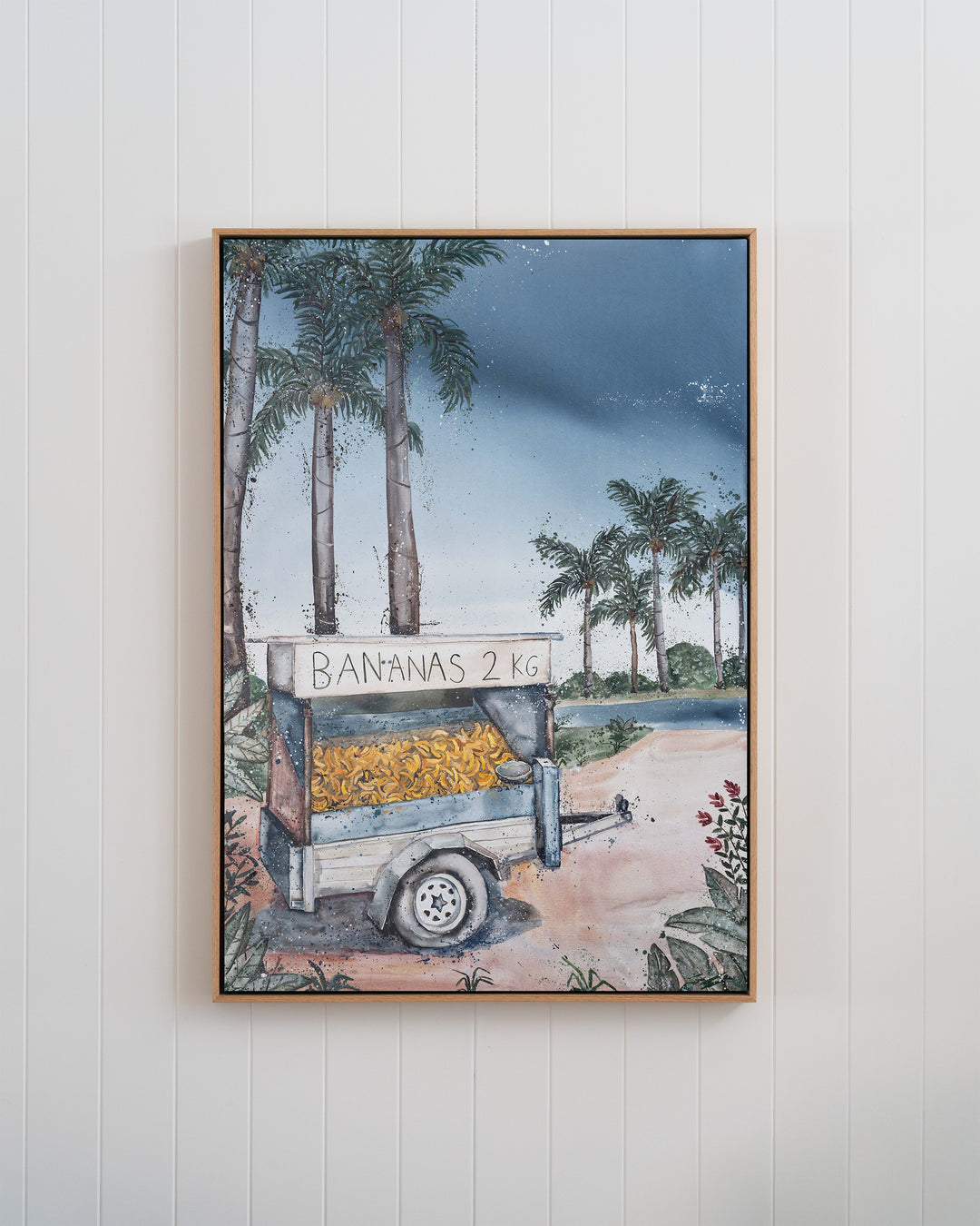 Banana Cart – tropical still life of a banana cart, framed canvas in oak float frame