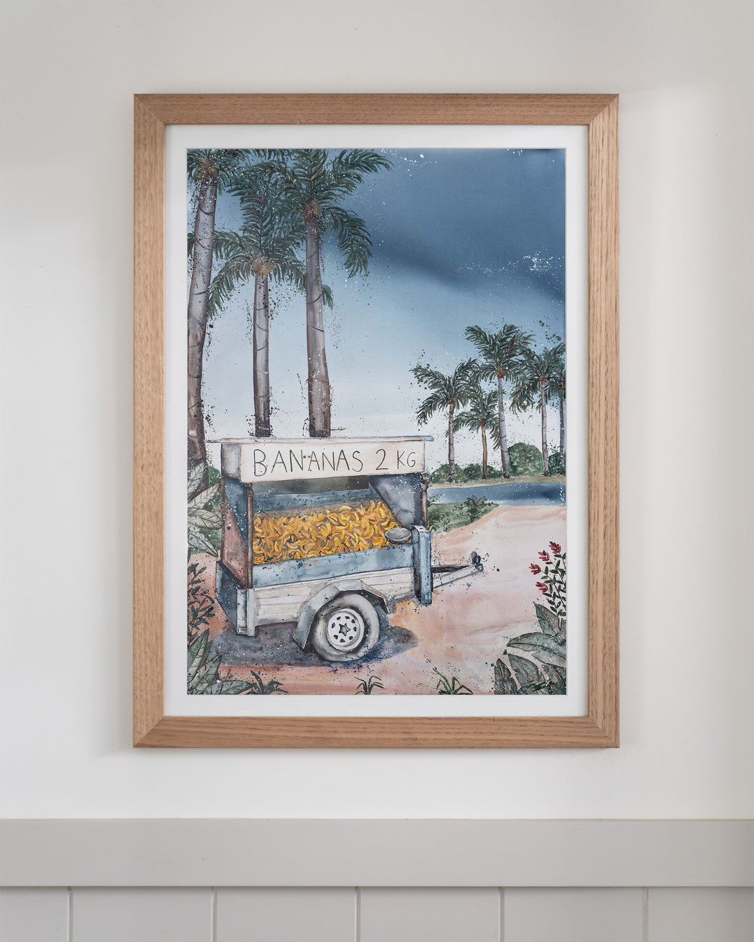 Banana Cart – tropical still life of a banana cart, framed paper print in oak frame