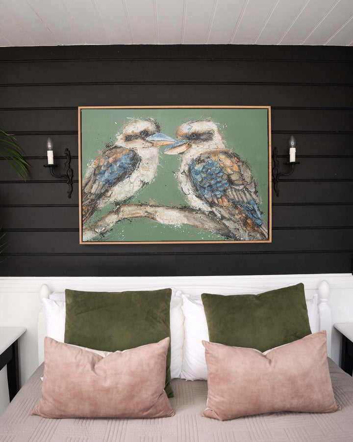 Beaks and Bedlam kookaburra fine art print by Stephanie Elizabeth, framed canvas in an oak frame in a bedroom