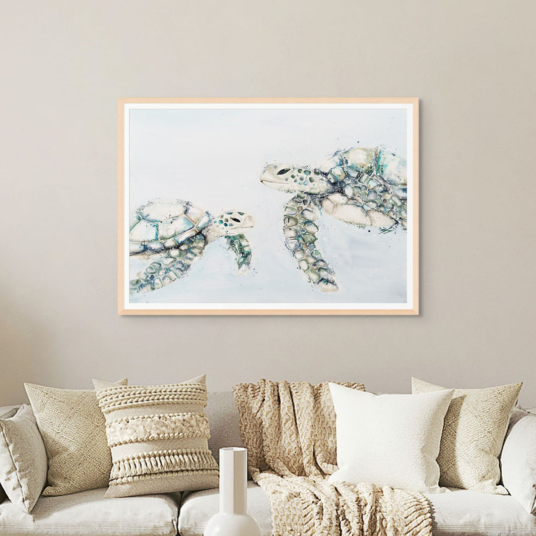 Better In Blue by Stephanie Elizabeth – framed paper print of two turtles with a light blue background, Australian fine art marine print