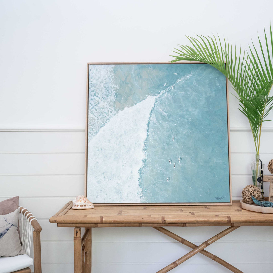 Beyond the Breakers – minimal ocean artwork featuring a single rolling wave in soft blue tones styled in calm coastal interior | Original Artwork