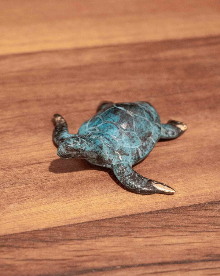 Hatchling Turtle sculpture in aged brass with a blue-green patina and polished gold-tone flipper tips.