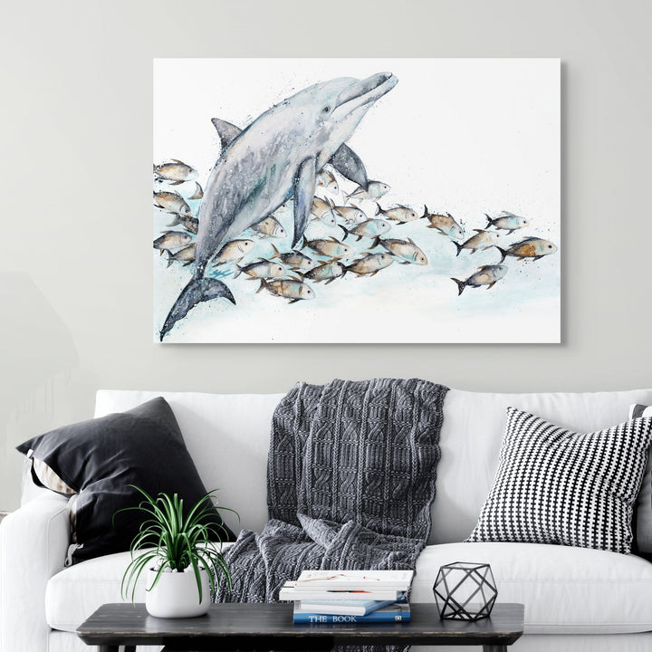 Bubble Toes by Stephanie Elizabeth – stretched canvas print of dolphin playfully swimming with trevally, marine life fine art print