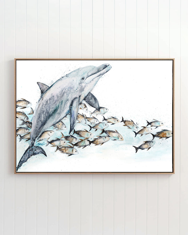 Bubble Toes – dolphin with a school of fish, framed canvas in oak float frame