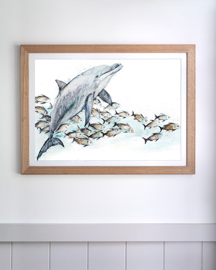 Bubble Toes – dolphin with a school of fish, framed paper print in oak frame