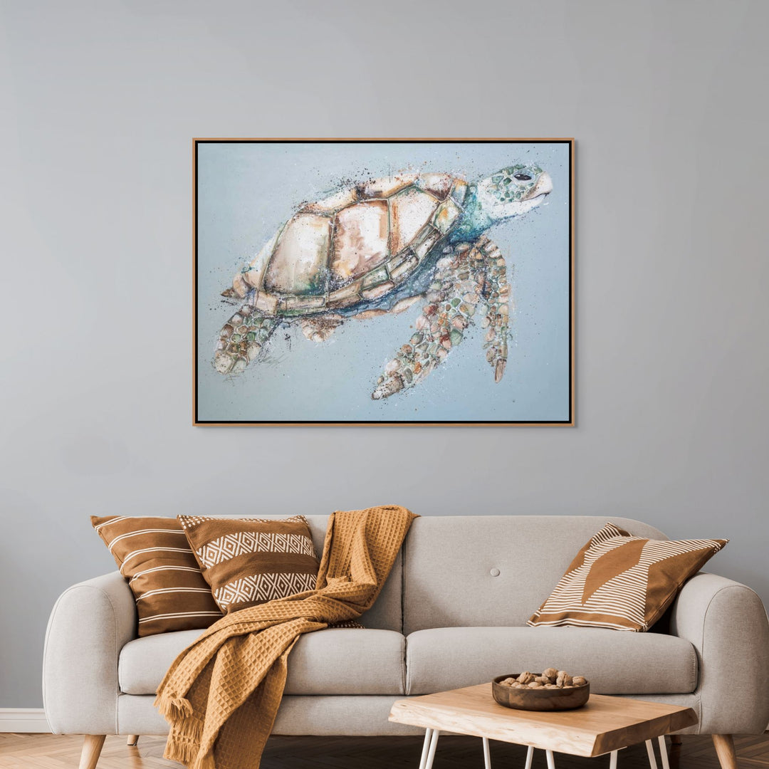 Changing Tides – Original acrylic painting on canvas of a green sea turtle with a subtle yellow wash on its shell, swimming in blue water | Framed Canvas Original