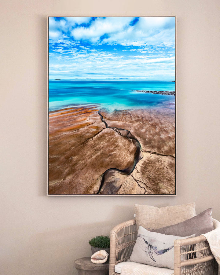 Cracks in the Ocean – Ocean Art, Aerial Photography by David Lloyd, framed canvas print in oak float frame, styled in a sitting room setting