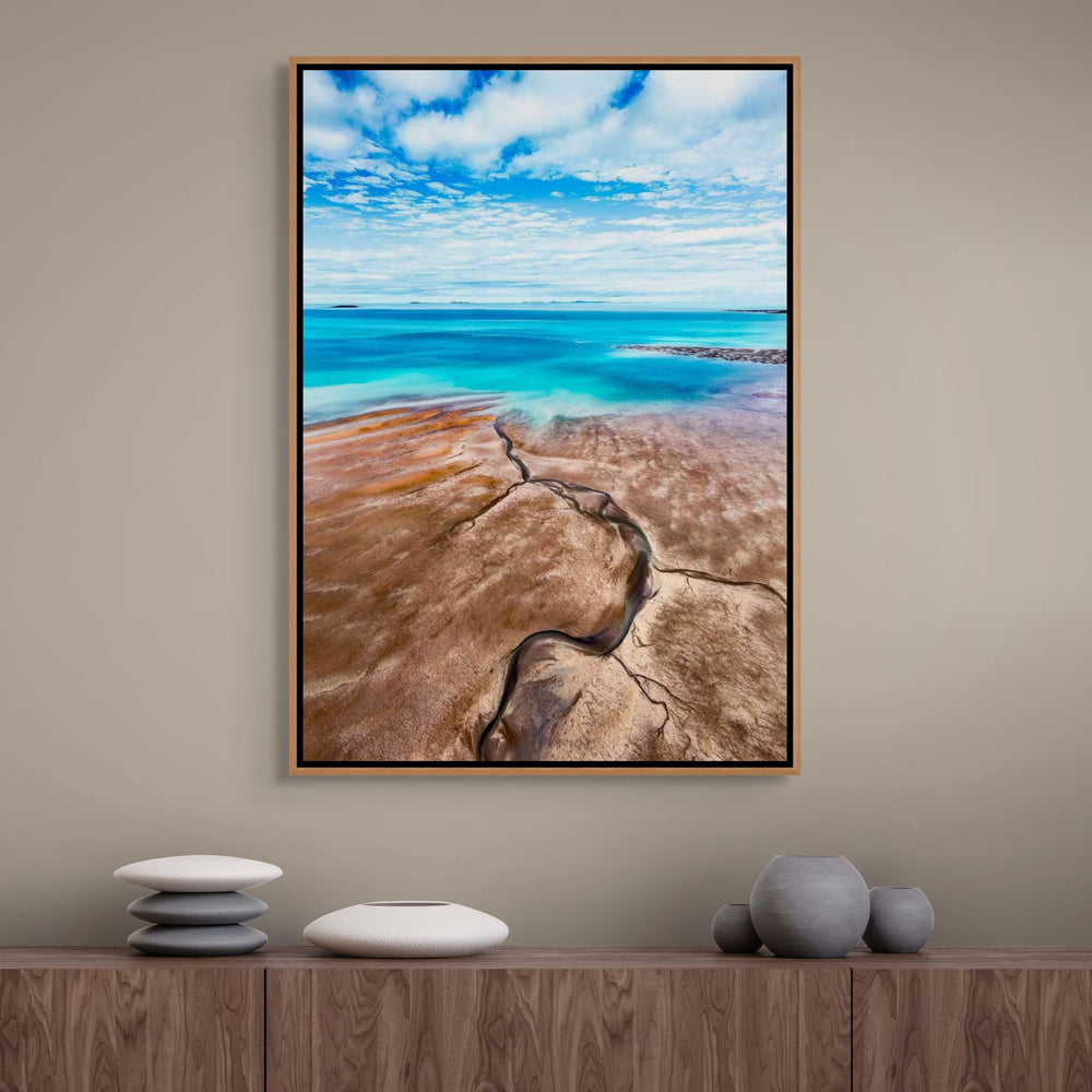 Cracks in the Ocean – Aerial view of textured brown sands and vivid blue ocean, low tide leading lines creating natural patterns | Shadow Box Canvas Print