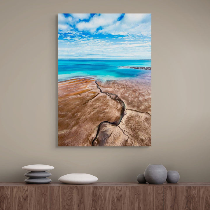 Cracks in the Ocean – Aerial view of textured brown sands and vivid blue ocean, low tide leading lines creating natural patterns | Stretched Canvas Print