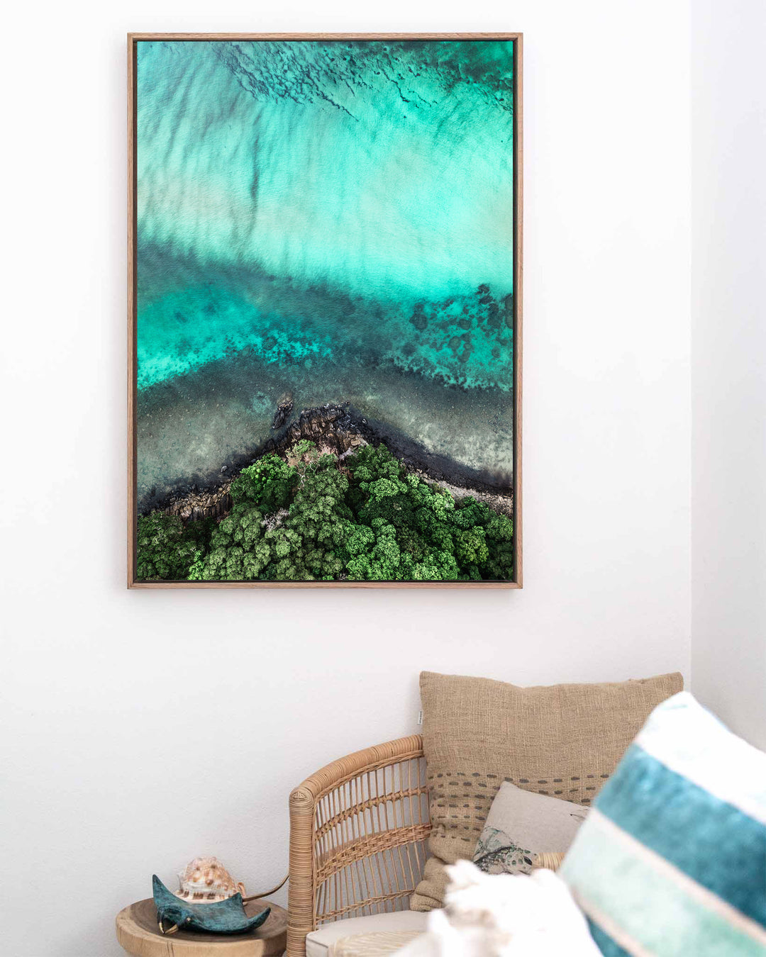 Don’t Dream It’s Over – Cape Tribulation, Aerial Photography by David Lloyd, framed canvas print in oak float frame, styled in a coastal lounge setting