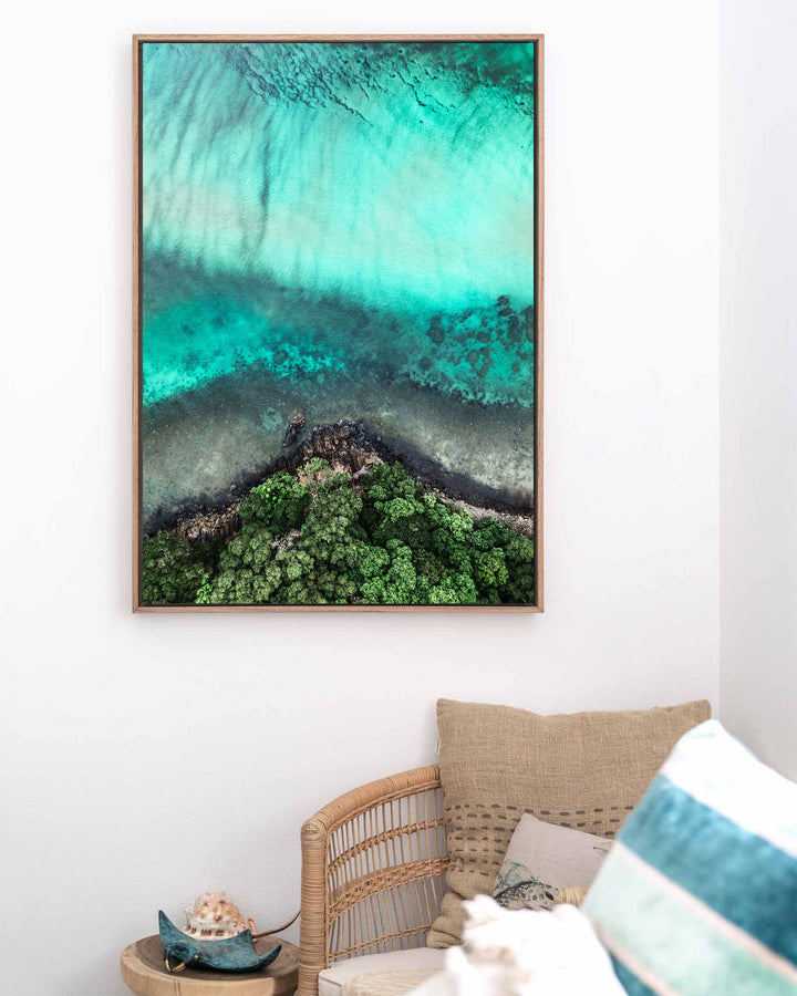 Don’t Dream It’s Over – Cape Tribulation, Aerial Photography by David Lloyd, framed canvas print in oak float frame, styled in a coastal lounge setting