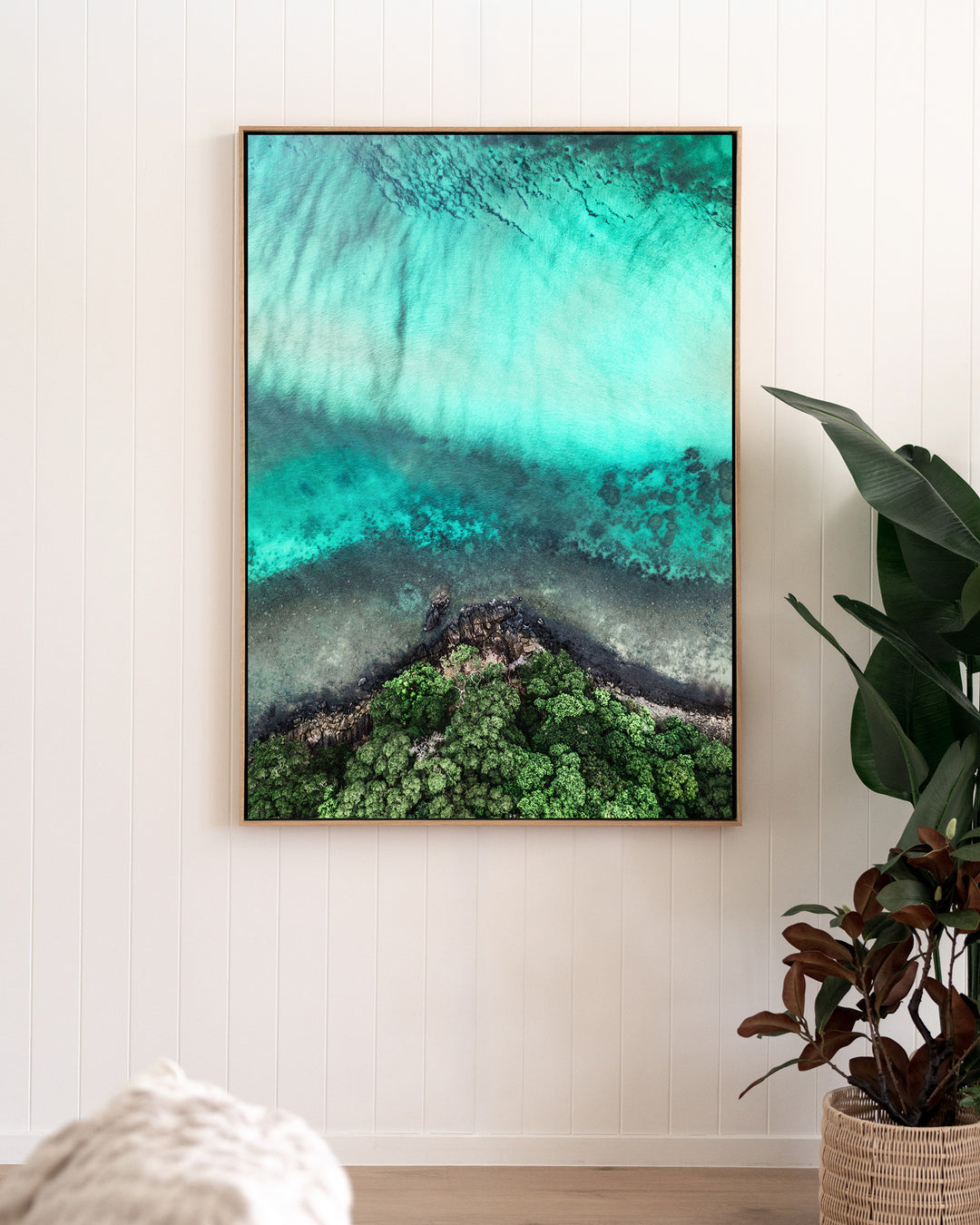 Don’t Dream It’s Over – Cape Tribulation, Aerial Photography by David Lloyd, framed canvas print in oak float frame, styled in a living room setting
