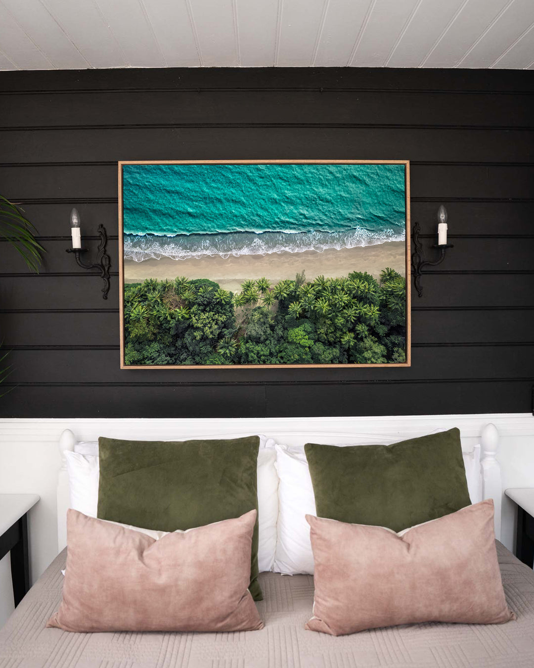 Emerald Tide – Four Mile Beach, Aerial Photography by David Lloyd, framed canvas print in oak float frame, styled in a bedroom setting