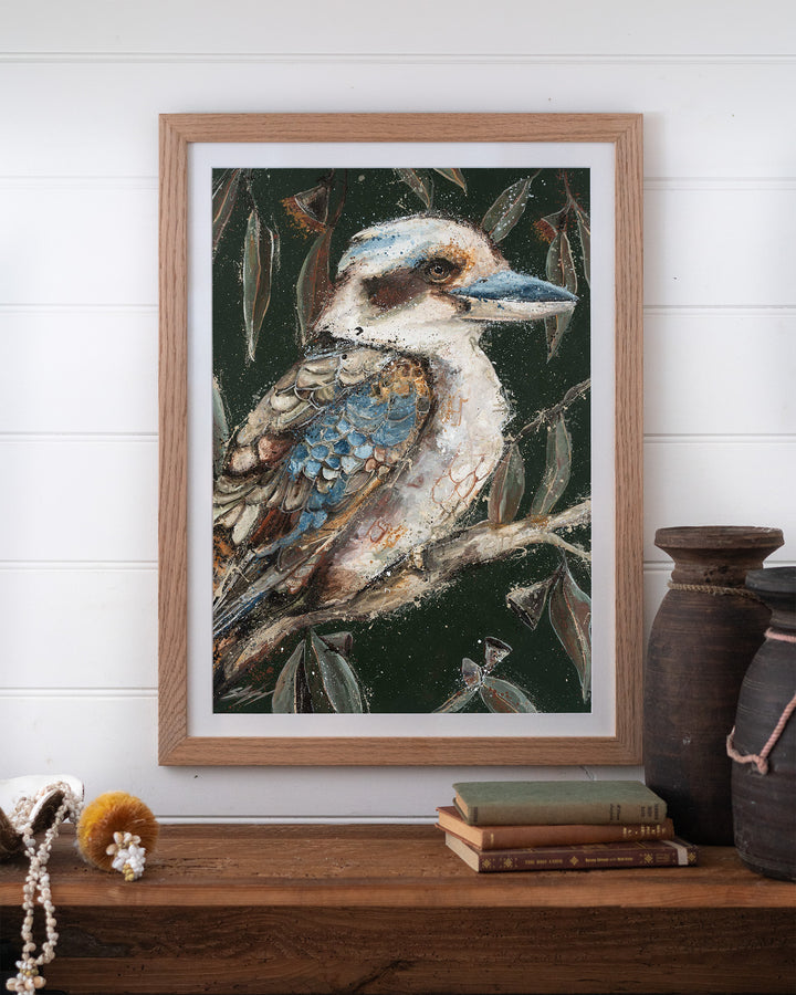 Fablewood kookaburra fine art print by Stephanie Elizabeth, framed paper print in an oak frame on a shelf