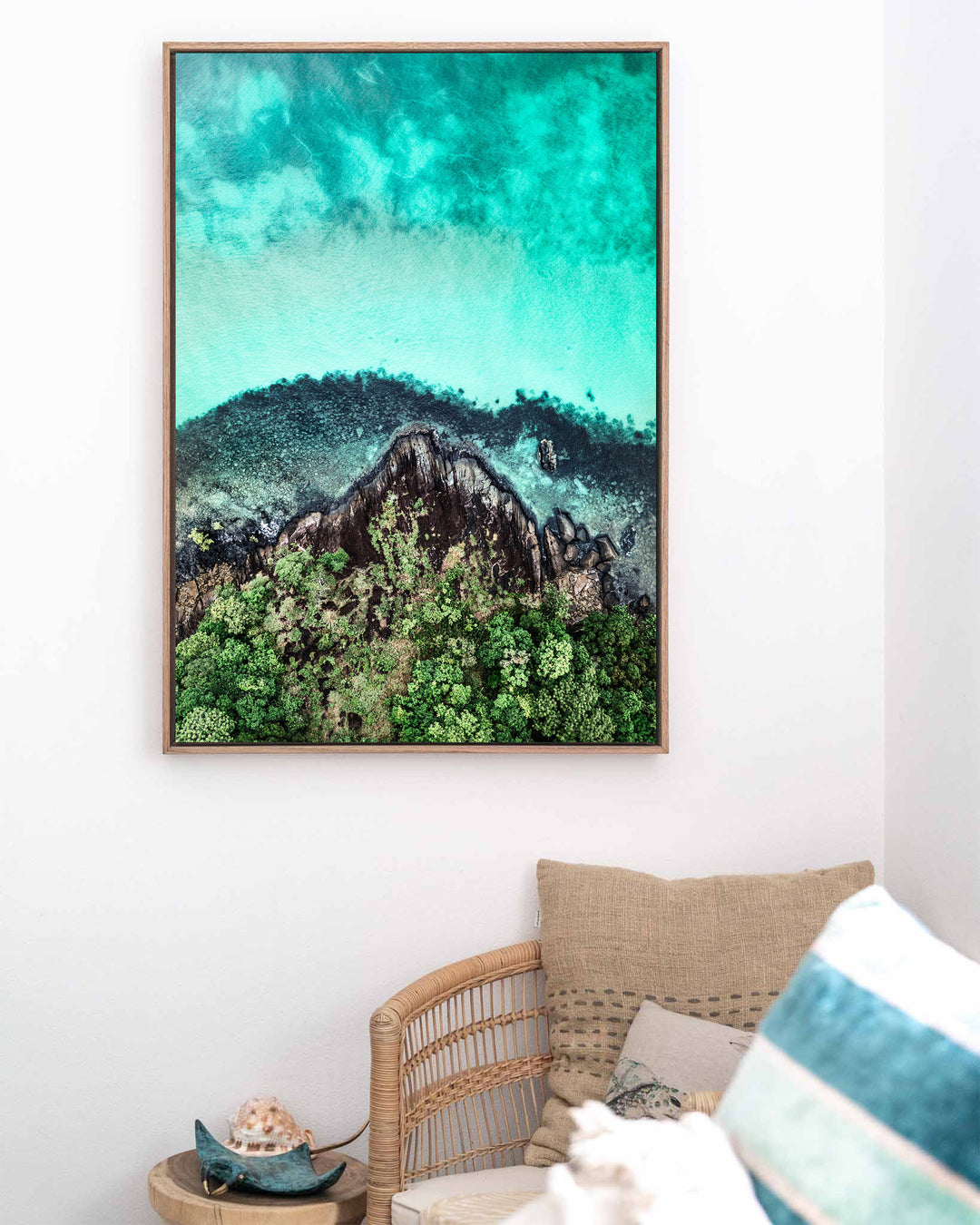 Fall At Your Feet – Cape Tribulation, Aerial Photography by David Lloyd, framed canvas print in oak float frame, styled in a coastal lounge setting